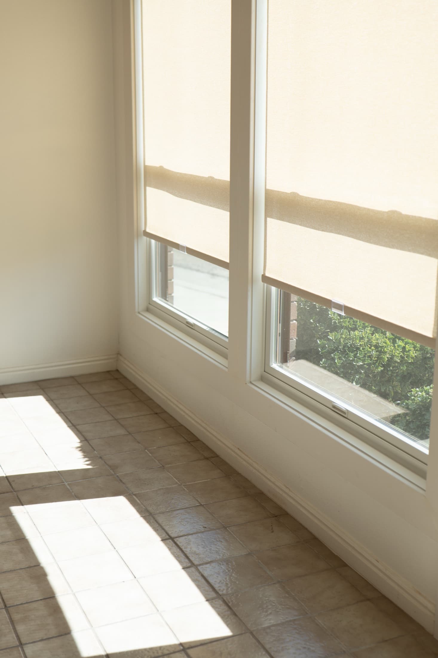 Kitchen window shades in a new-construction home